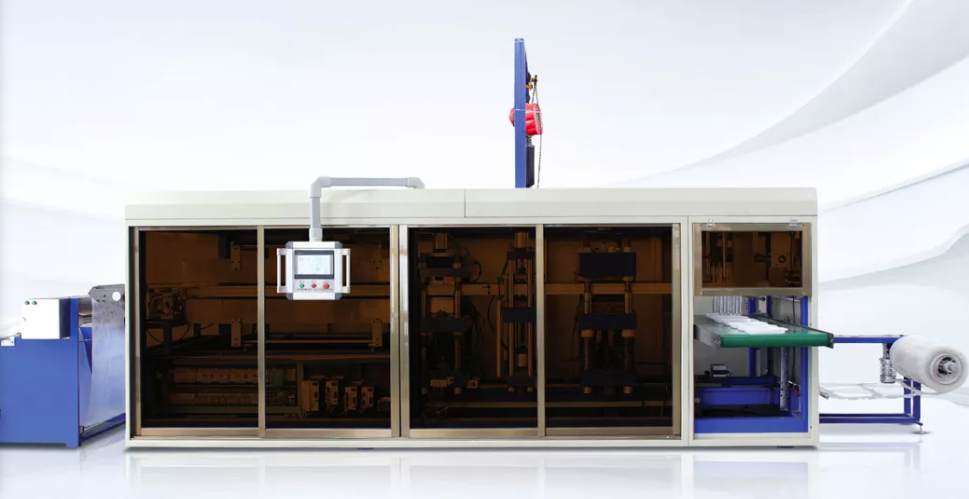  A multistation thermoforming machine in action, efficiently shaping plastic sheets into precise molded products across multiple stations.